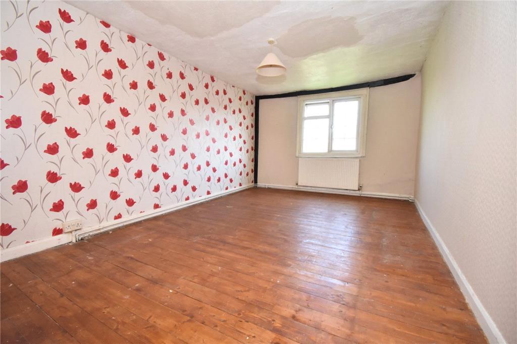 Bedroom 3 with wooden floors