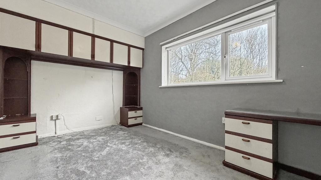 Bright double bedroom with built-in over-bed st...