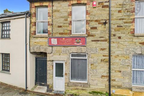 'Three-bedroom town-centre home with workshop & offered with no onward chain'