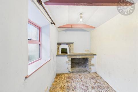 undefined, 'Three-bedroom town-centre home with workshop & offered with no onward chain'