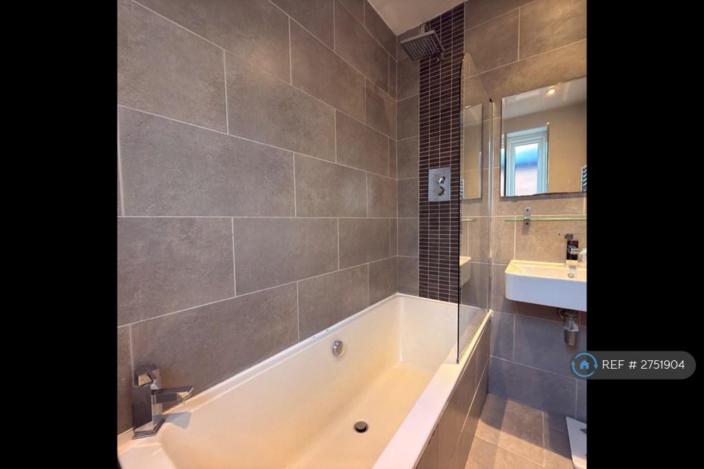 Bathroom With Shower Over Bath