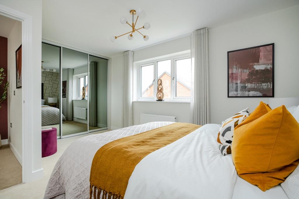 A stunning main bedroom with room for fitted...