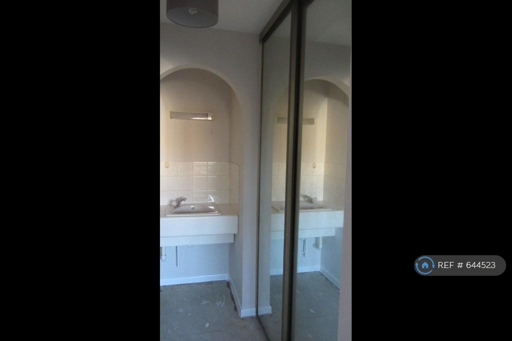 Large Bedroom Wardrobe And Sink Area