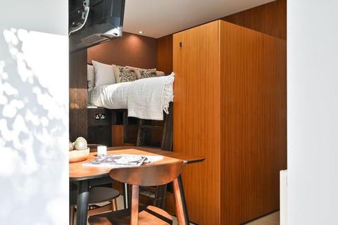 Studio to rent, Dennington Park Road, London