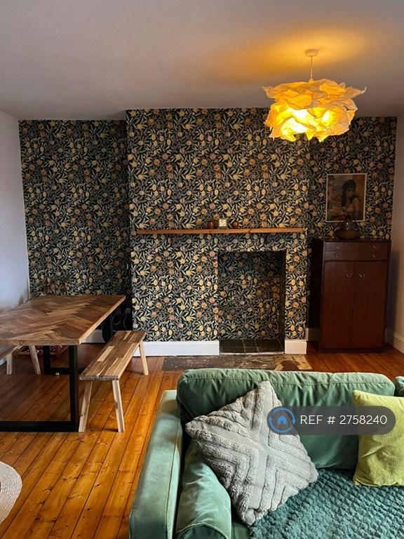 Living Room  (Redecorated By Current Tenants)