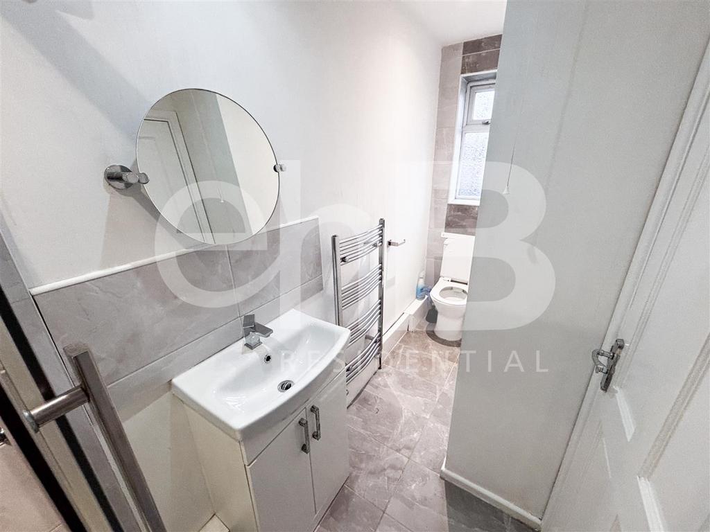 Bathroom 2.Edited logo.jpg