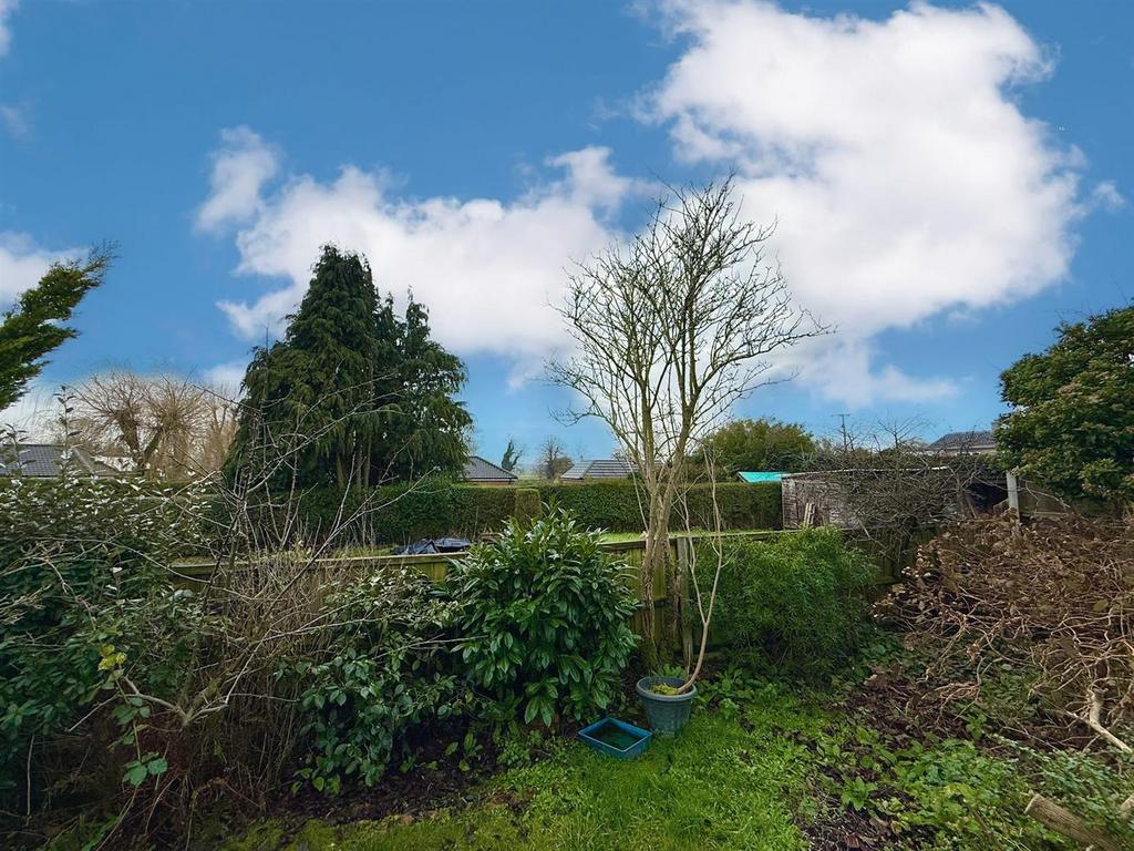 Outlook beyond rear garden