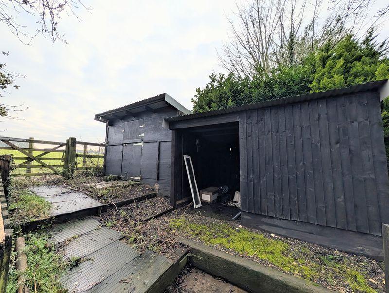 Outbuilding to right