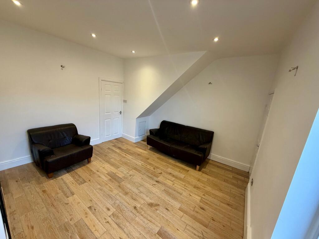 Bright, recently refurbished living room with r...