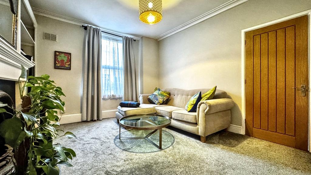 Bright, stylish living room with a comfortable ...