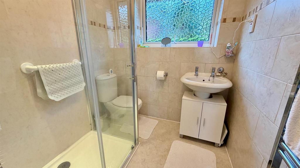 Tiled modern 3 piece shower room