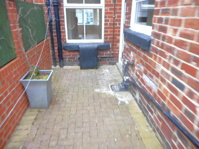 Enclosed rear courtyard