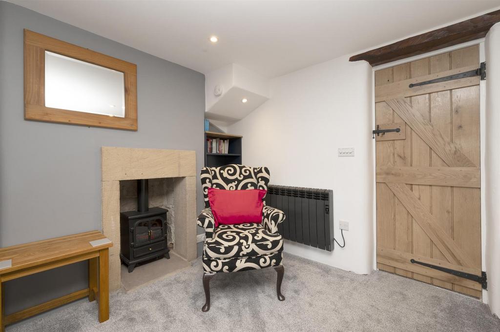Manor Cottage Bedroom One fireplace.jpg