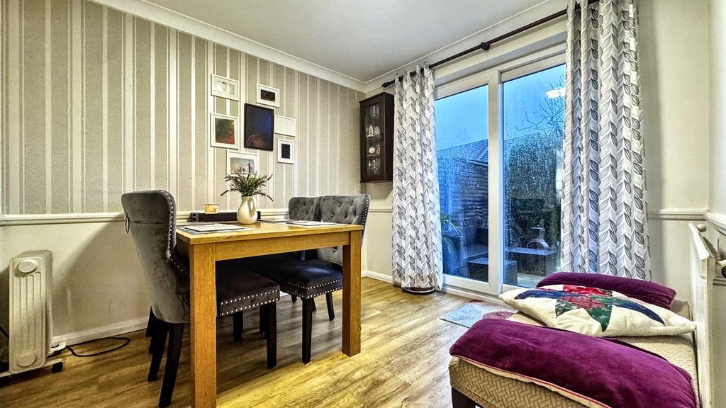 Bright, modern living room with wood flooring, ...