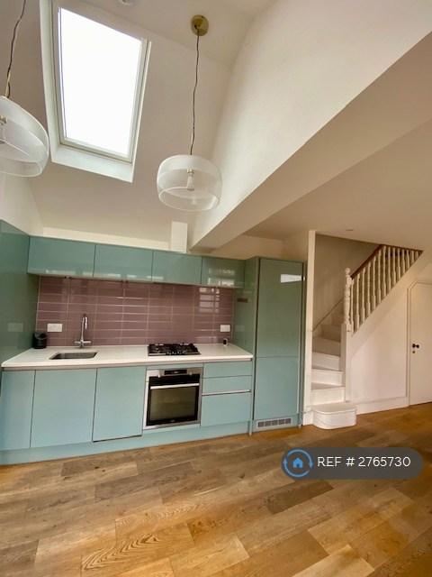 Kitchen And Stairs To First Floor