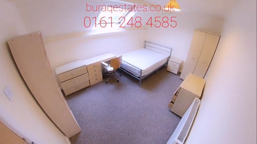 Bright, neatly furnished double bedroom with a ...