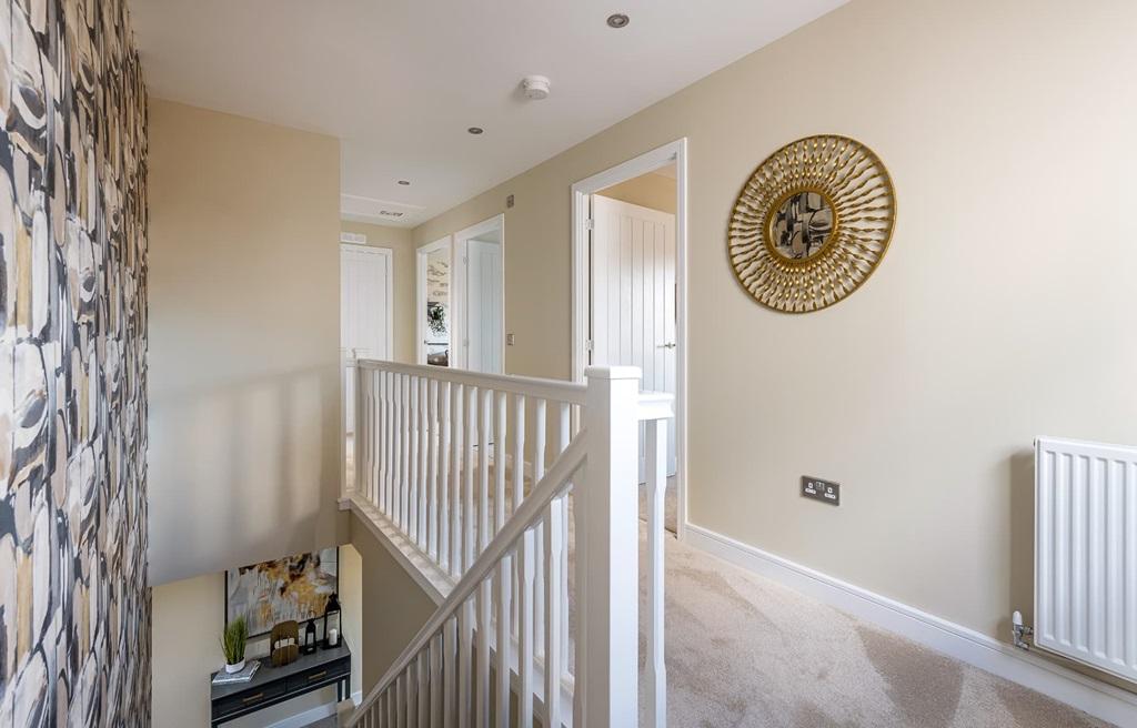 Bright landing leading to the bedrooms