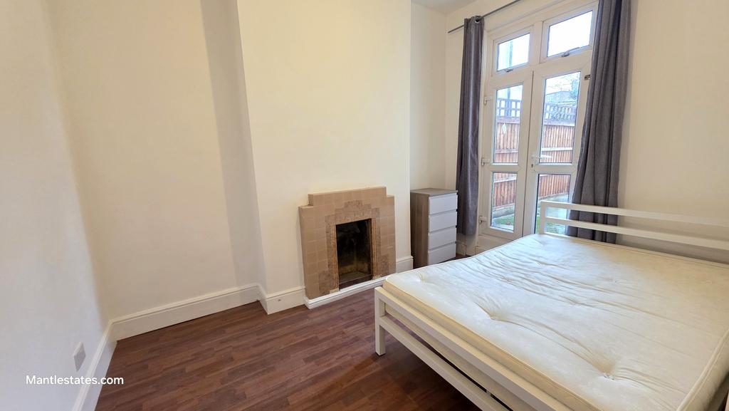 Rear reception/bedroom