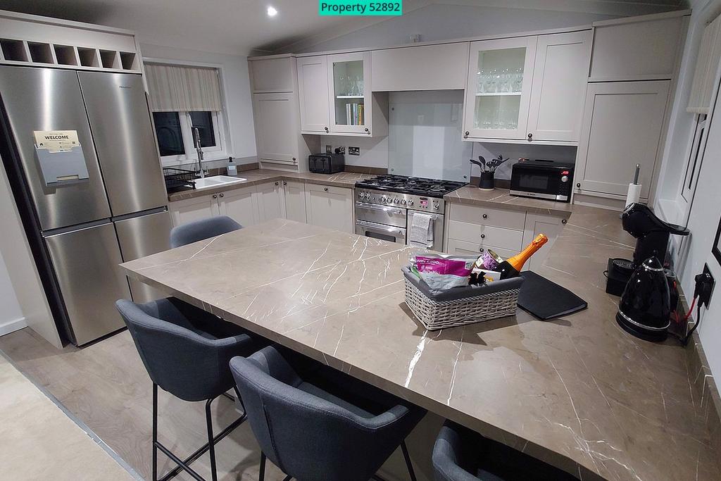 Kitchen with American-style fridge freezer