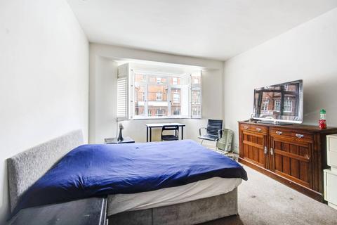 Studio to rent, Barton Court, Barons Court, London, W14