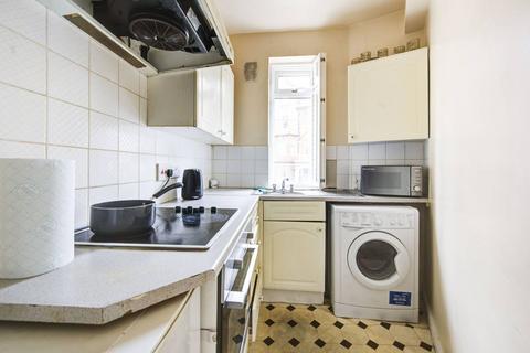 Studio to rent, Barton Court, Barons Court, London, W14