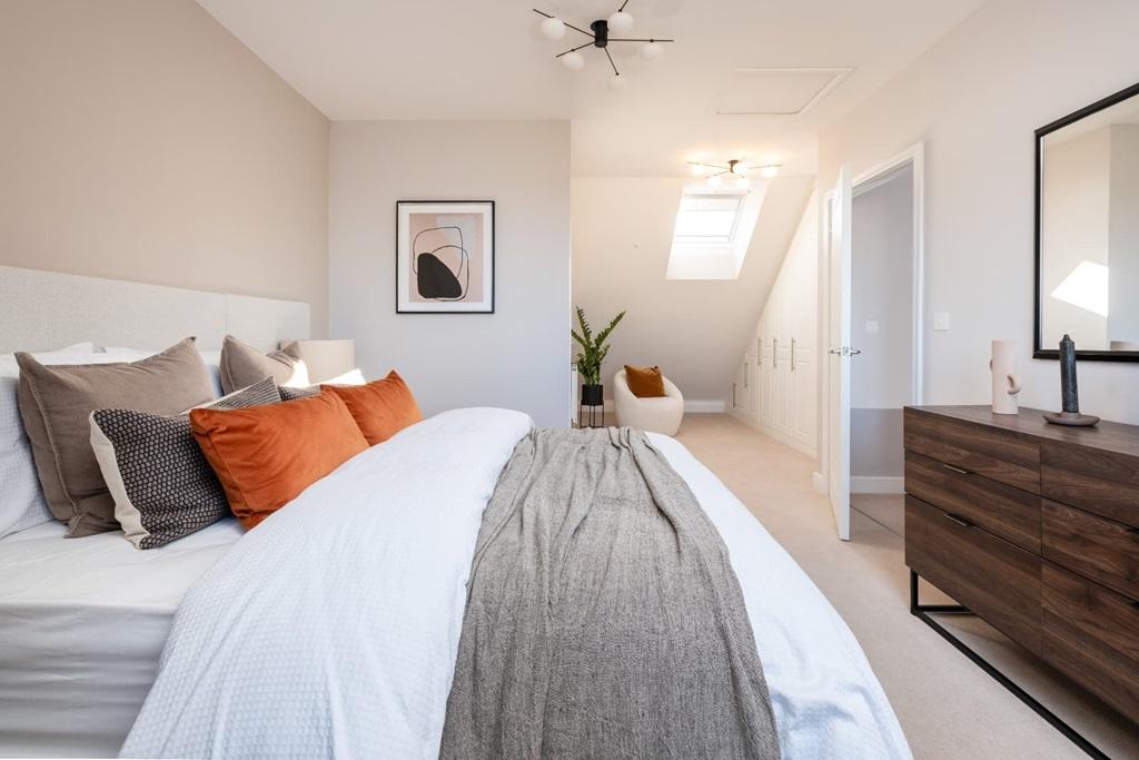 Bedroom 2 occupies the top floor