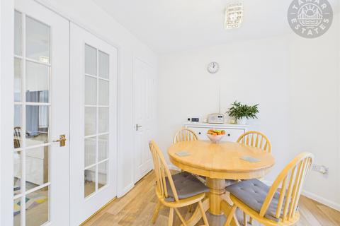 undefined, 'Three-bedroom end-terrace home with parking, arranged over 756 sq. ft.'