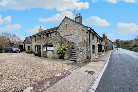 undefined, Burton Bradstock