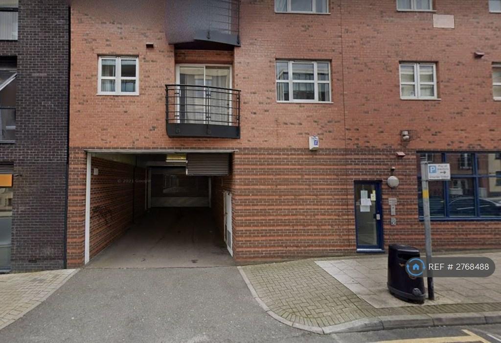 Front Of Building & Car Park