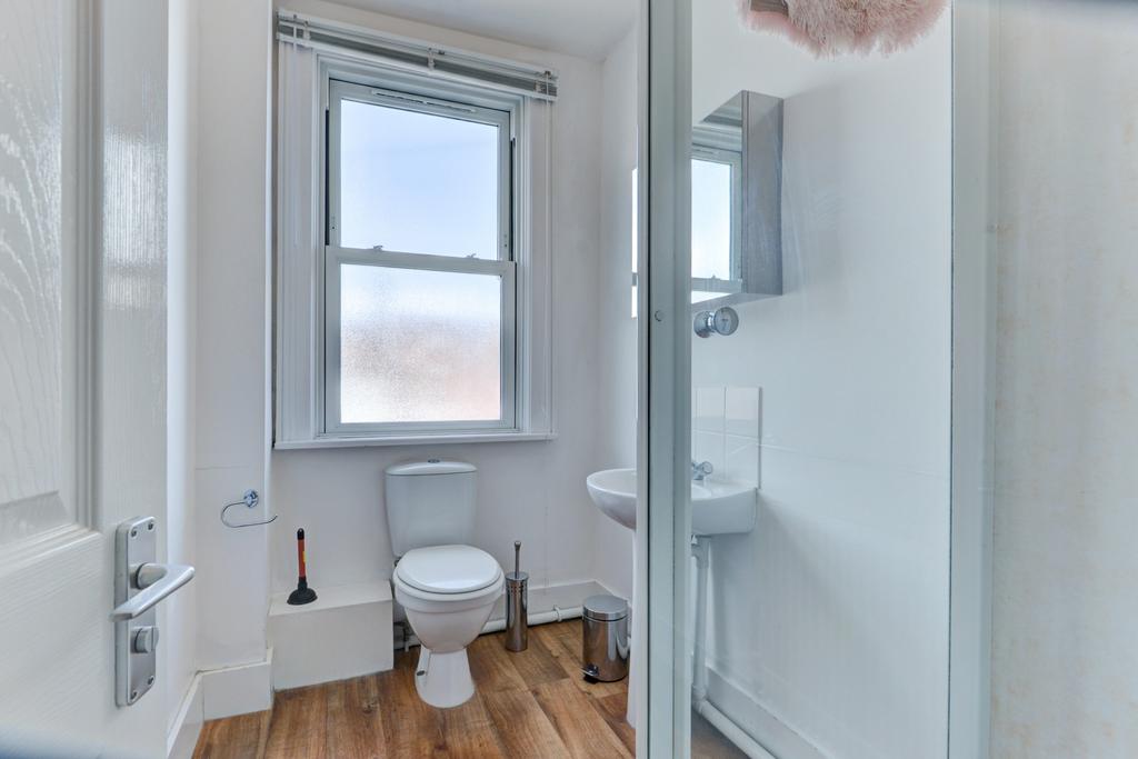A clean and well-maintained bathroom featuring ...