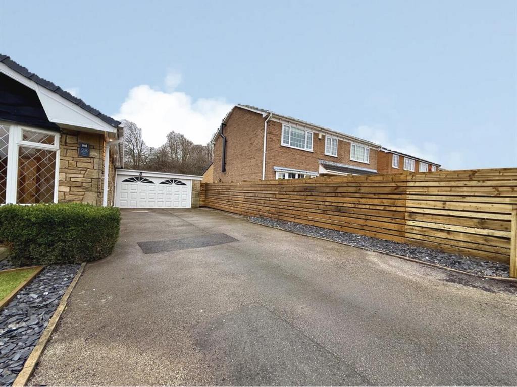 Double garage and drive