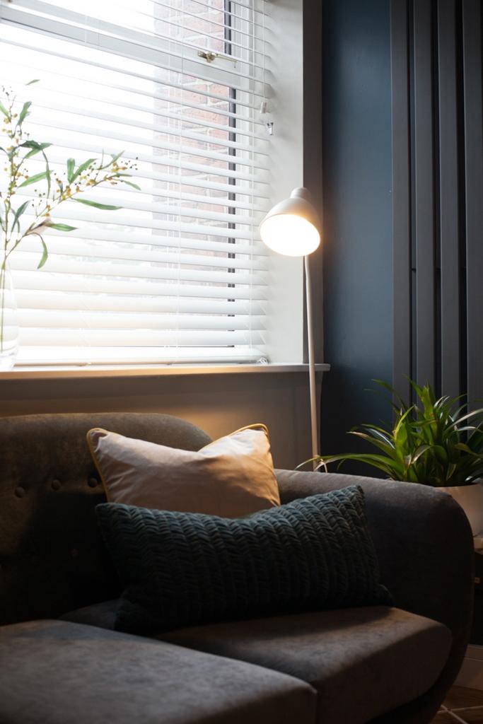 Bright, stylish living area with a comfortable ...