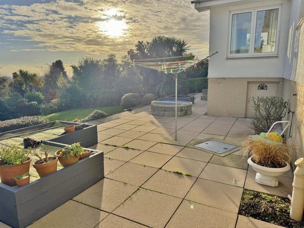 South facing patio - raised beds and pond
