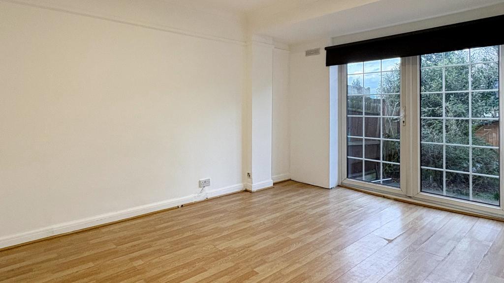 Bright, modern living room with wide floor-to-c...