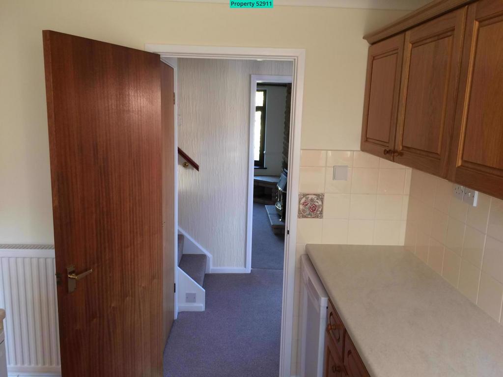 Kitchen through to hall