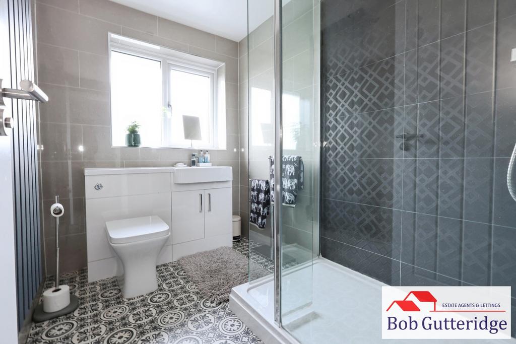 Fully tiled luxury shower room