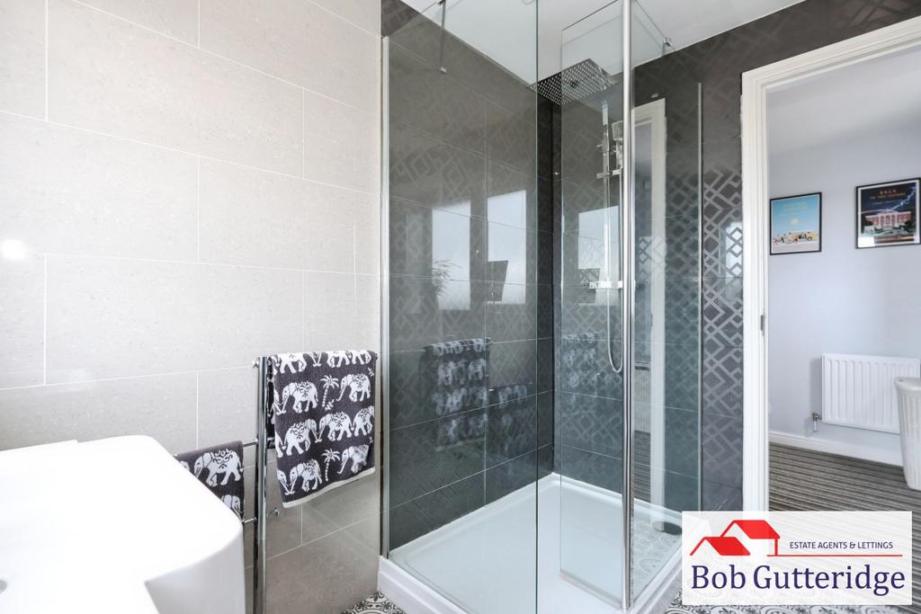 Fully tiled luxury shower room