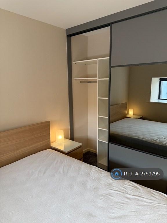 Built In Multi-Compartment Wardrobe
