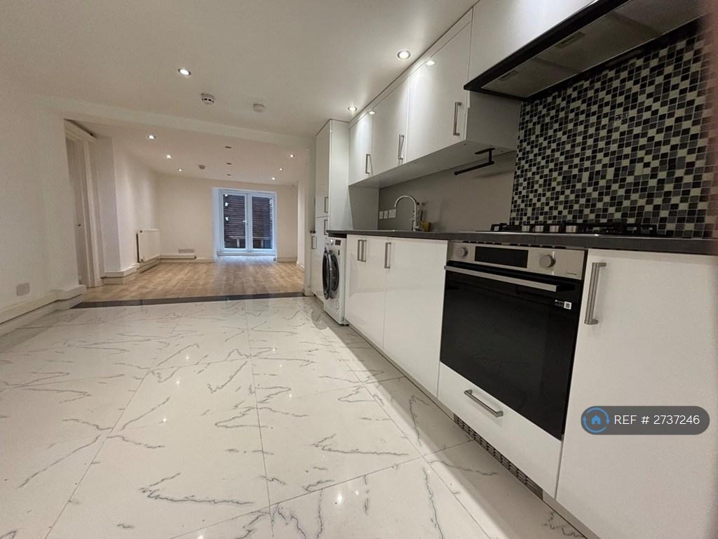 Open Plan Sitting Room And Kitchen