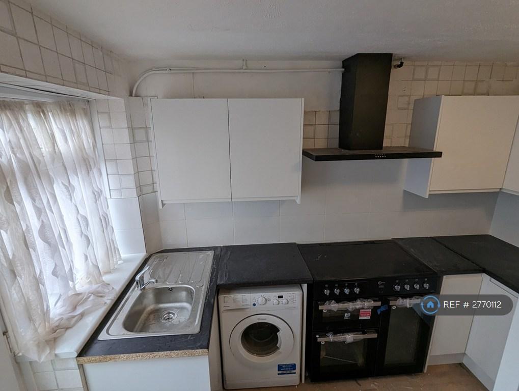 Kitchen View With Rear Garden Access