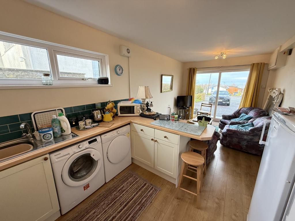 Ground Floor Family Room and Utility Area