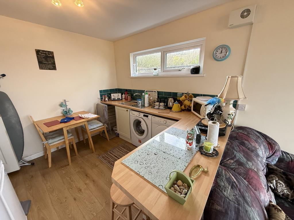 Ground Floor Family Room and Utility Area