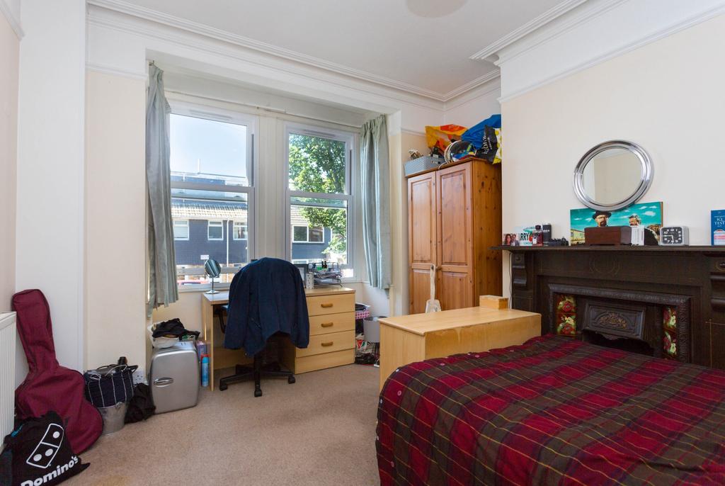 Bright, well-presented bedroom with a large fro...
