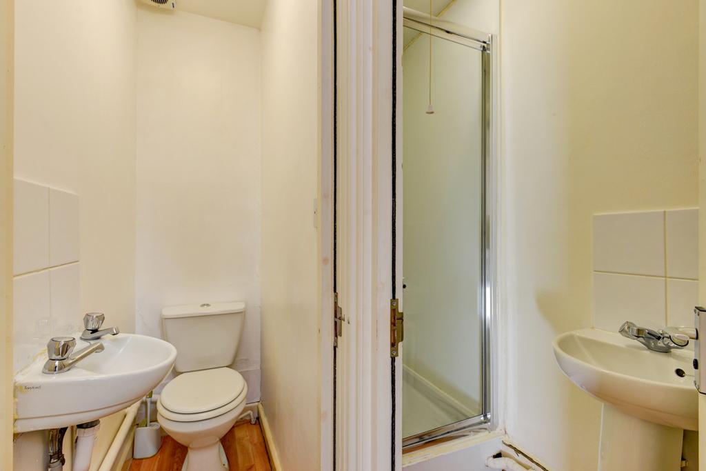 A clean, well-maintained bathroom featuring a l...