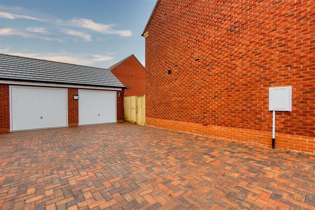 Double garage and driveway