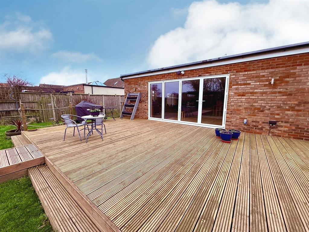 Garden deck and bifold doors