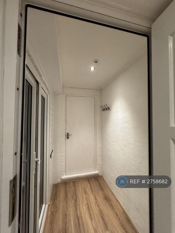 Entrance Hall With Storage Cupboard