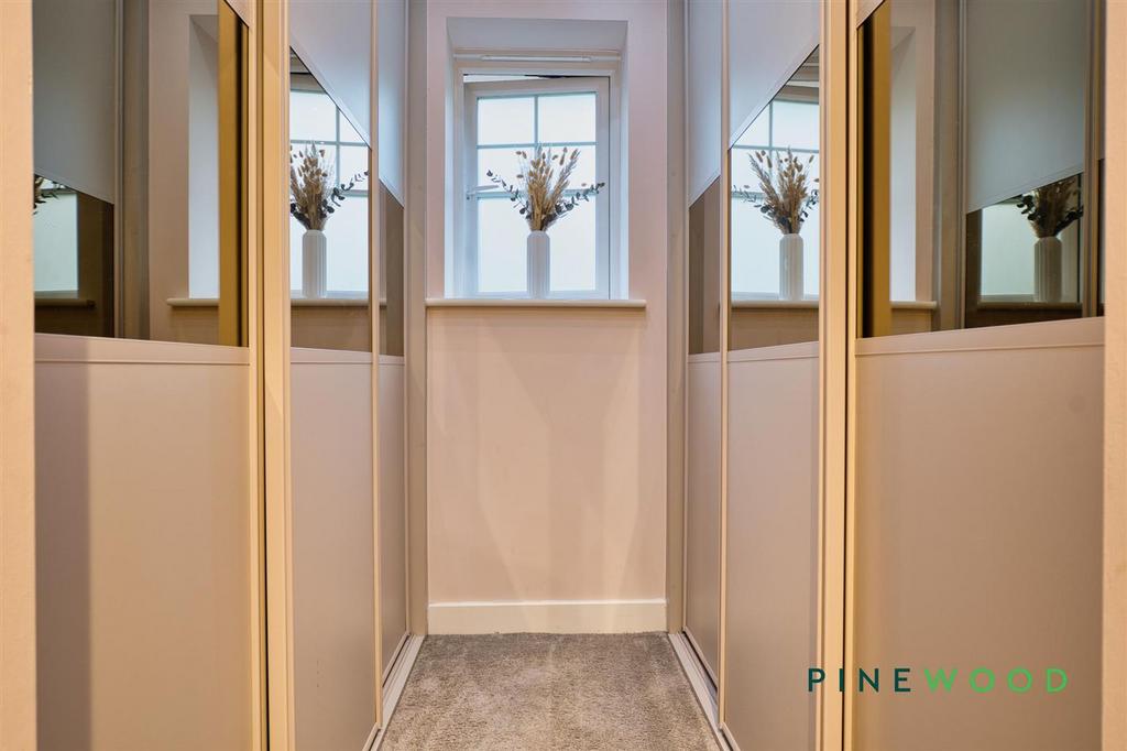 Walk in wardrobe (bedroom 1)