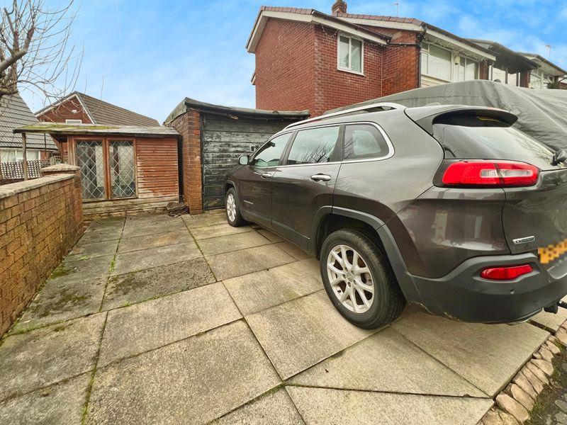 Driveway to the rear