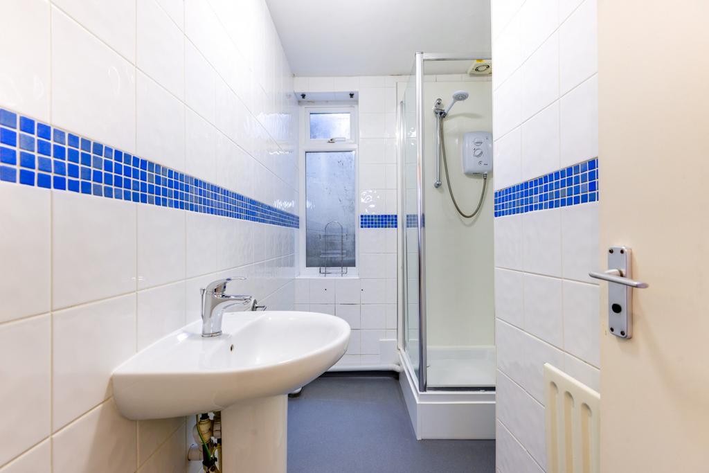 A clean and well-maintained bathroom featuring ...